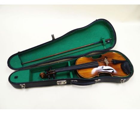 A BOOSEY & HAWKES 'GOLDEN STRAD' VIOLIN with case and bow