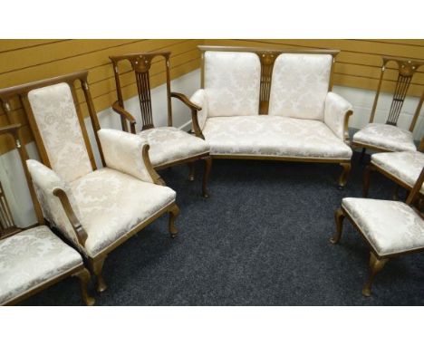 A MOTHER-OF-PEARL INLAID SEVEN PIECE DRAWING-ROOM SUITE in mahogany with inlay