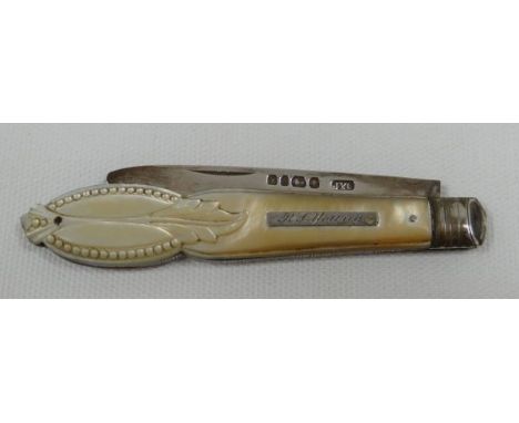 A MOTHER-OF-PEARL HANDLED SILVER FRUIT-KNIFE the mother-of-pearl with dimple and raised leaf decoration and bearing plaque in