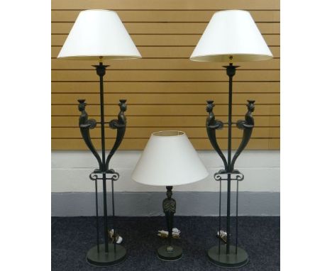 A PAIR OF MODERN FIGURAL STANDARD LAMPS green painted on circular bases and with a matching table lamp