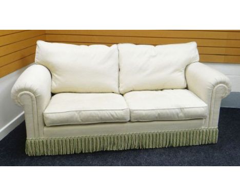 A MODERN TWO SEATER DURESTA SOFA in cream upholstery