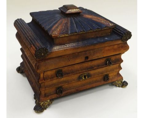 A GEORGE III TRAVELLING-SET WITH 'AS WE FOUND IT' CONTENTS the serpentine shaped box with two drawers and a hinged lid, it is