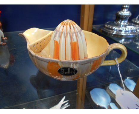 A Shelley drip-glaze juice squeezer 