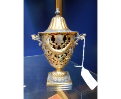 A Chester 1912 silver gilt lidded two handled preserve cup having pierced scroll and swag decoration and acanthus finial, app