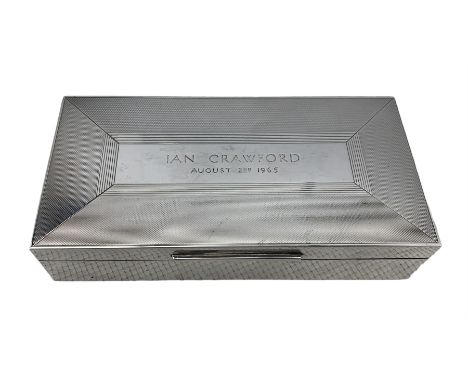 Silver rectangular cigarette box with engine turned hinged cover with inscription W18cm Circa 1965 Maker Padgett & Braham