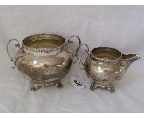 Circular cream jug and matching sugar basin with  foliate rims 5” over handle chest 1908 by HEB FEB 330g          