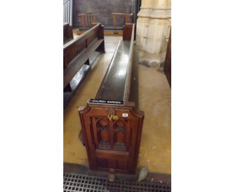 Late Victorian heavy oak pew with carved ends  with small piece cut out from hymn shelf at rear 11’6”  