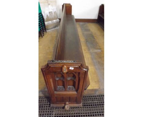 Late Victorian heavy oak pew with carved ends  with small piece cut out from hymn shelf at rear 11’6”  
