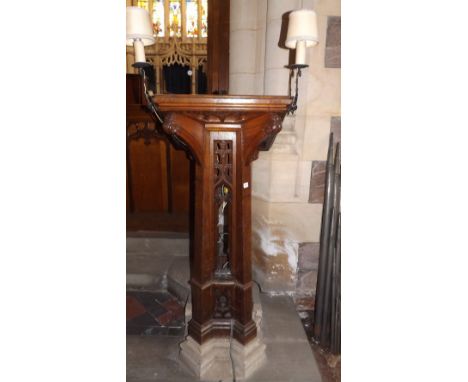 Late Victorian oak lectern of Gothic design with sloping book rest and two metal light holders 48” tall (excluding  stone pli