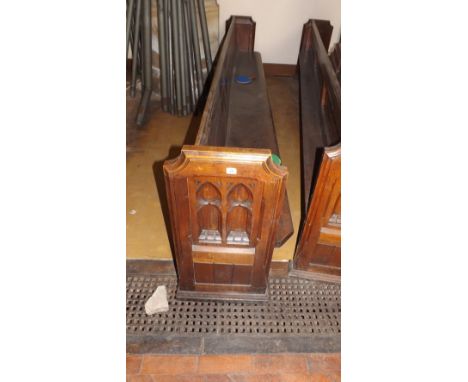 Late Victorian heavy oak pew with carved ends  with small piece cut out from hymn shelf at rear 11’6”  