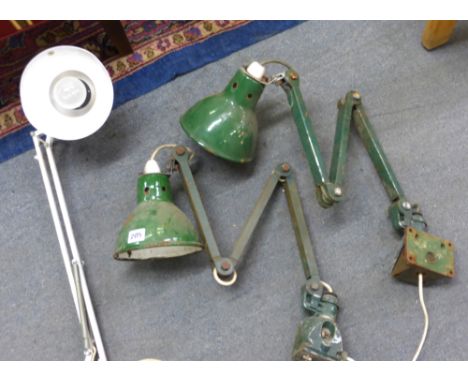 Two 1950/60's green enamelled machinist's adjustable work lamps together with a white enamelled lamp