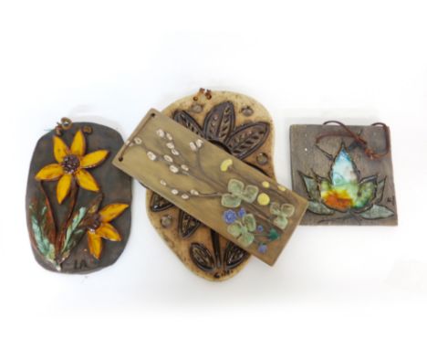 Tilgmans, Sweden, a tile decorated with a maple leaf, probably by Eivol Larsson, w. 16.5 cm, together with three further tile
