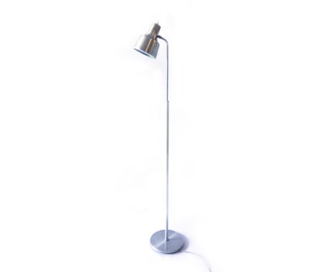 A 1970's stainless steel single spot standard lamp   CONDITION REPORT:  Working order unknown. Lead cut. Typical dents, wear 