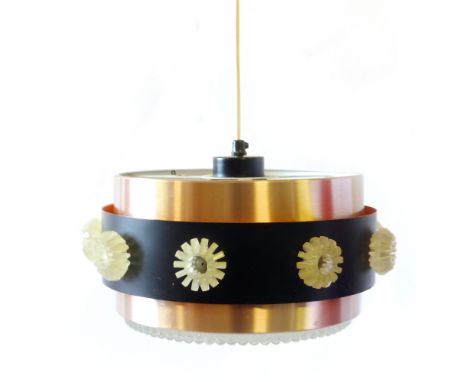 A 1970's ceiling light with copper coloured and black enamelled shades, perspex motifs and a moulded glass base