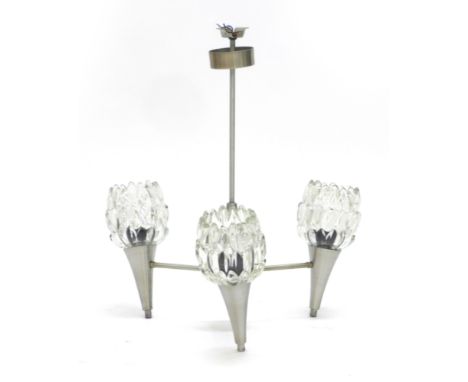 A 1970's aluminium three branch ceiling light with glass shades of flame form   CONDITION REPORT:  Working order unknown