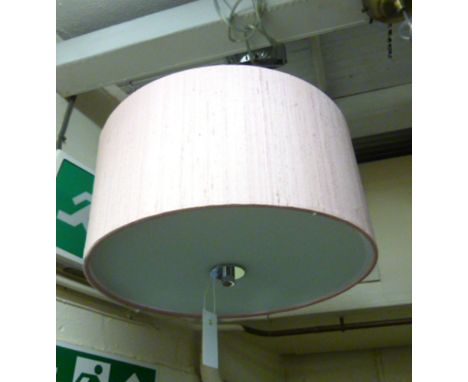 A contemporary single lamp light fitting with a pink shade*Please note: VAT @ 20% will be added to the bid price of this lot