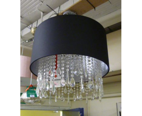 A contemporary single lamp light fitting with glass lustres and a black shade*Please note: VAT @ 20% will be added to the bid