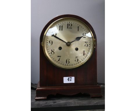 Good Quality Mahogany cased domed mantel clock with numeral dial 