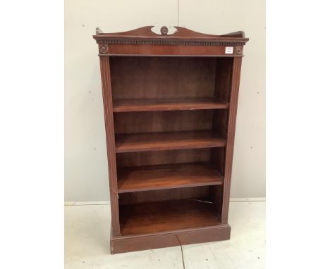 A George III style narrow mahogany open shelf bookcase, width 76cm, depth 35cm, height 131cm. Condition - good