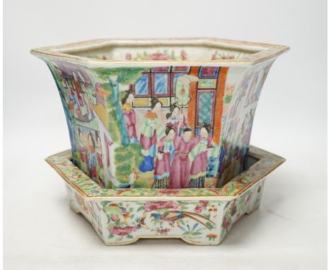 A 19th Chinese Canton decorated famille rose hexagonal planter, with stand, the stand cracked, 19.5cm total. Condition - fair