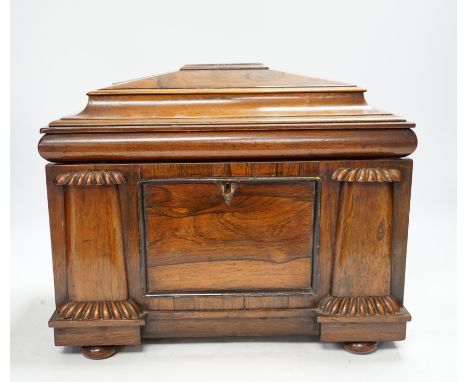 A large William IV rosewood sarcophagus tea caddy, 27cm high. Condition - escutcheon missing, fair