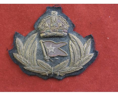 White Star Line Officers Cap badge, a scarce Titanic interest item. (Aged stage prop)
