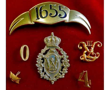 Imperial German Badges including: A Bavarian Ersatz Pickelhaube Helmet plate division 1655, a Prussian Officer's cap badge, D