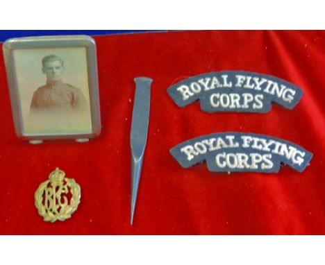Royal Flying corps Shoulder titles and Cap Badge including a small framed portrait of the wearer, also with an aerial flashet