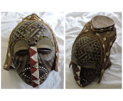 African Kuba Mask  Artistically made with beads and shells.  Stunning helmet mask.