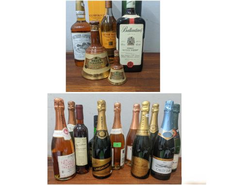 One bottle of Southern Comfort, two Bells flasks, one bottle of Ballantines finest scotch whisky 112.5cl, one bottle of Glenf