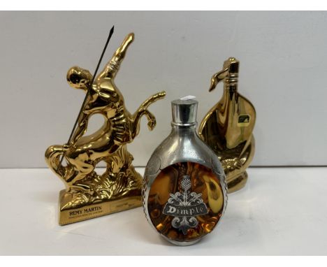 A Limoges flask Larsen Cognac and Remy Martin flask, along with one bottle of Dimple Haig,  Location: R1If there is no condit