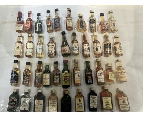 A very large collection of over 290 miniatures, to include Scotch Whisky, Vodka, ceramic novelty miniatures Location: R5If th