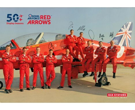 RAF Red Arrows 2014 Display Season Full Team Signed 12x8 Colour Photo of Red Arrows Pilots Standing Alongside a Red Arrow Jet