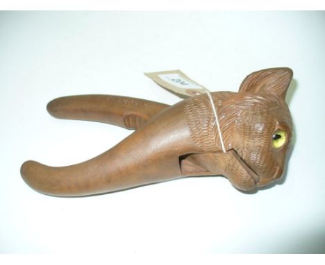 A Novelty black forest type nutcracker in the form of a cat.