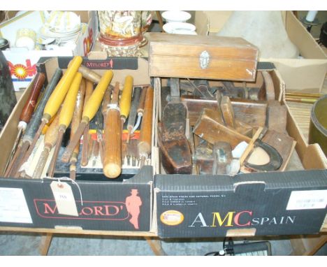 A Collection of woodworking tools to 2 boxes , various chisels and planes.