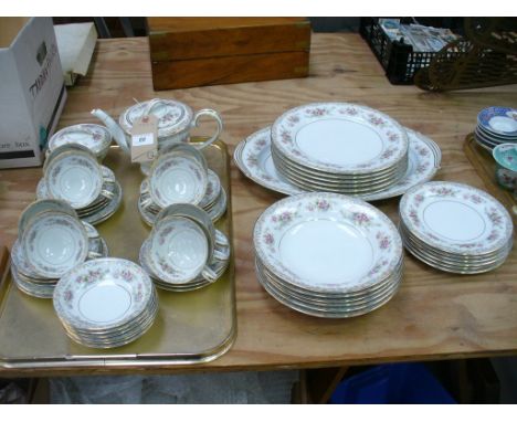 A Noritake " Somerset " tea and dinner service comprising a teapot, cups and saucers, sugar basin with cover, dinner, side pl