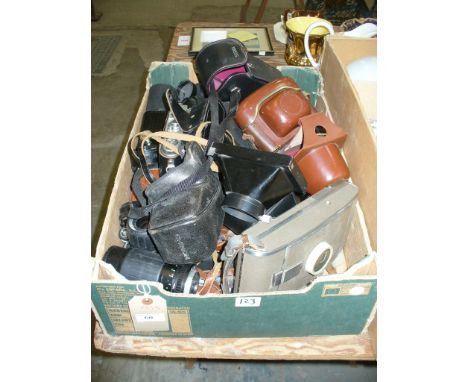 A Box of cameras and camera lenses including Zorki 4 K, Ricoh lens, etc.