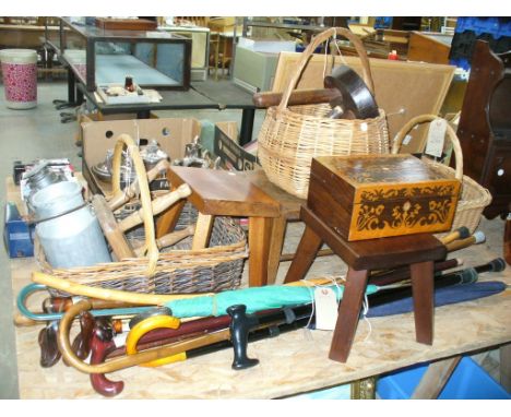 Three assorted wicker baskets, various rustic stools, a collection of walking sticks and umbrellas , a 19th Century inlaid st