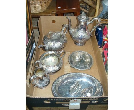 A Victorian Mappin and Webb four piece tea set comprising a teapot of compressed form with a scroll handle and fruit finial, 