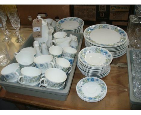 A Wedgwood " Clementine" tea and dinner service comprising coffee pot, cups, saucers, dinner and side plates, etc.