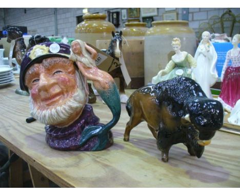 A Royal Doulton character jug " Old Salt " ( second ) and a ceramic model of a Bison , impressed mark 4732. (2)