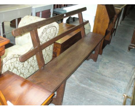 A Painted rustic hardwood bench with two parallel back rails.