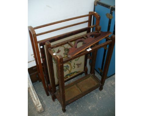 An Early 20th century oak stick stand, towel rail and needlework firescreen (3)