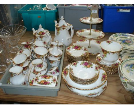 A Qty of Royal Albert " Old Country Roses" tea and dinner wares including a cake stand, tea and coffee pot, cups saucers, mil