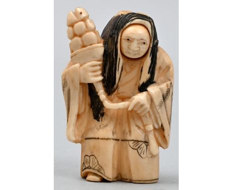   Netsuke mit zwei Gesichtern, Japan  Elfenbein, hergestellt vor 1945. Gesicht beweglich, zwei Gesichter, Künstlersignatur au