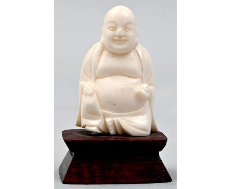   Elfenbein Buddha auf Holzsockel, 20. Jh.  Elfenbein, Holz, 5,5 x 3 cm Ivory Buddha on a wooden base, 20. Jh. ivory, wood   