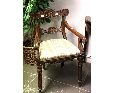 Victorian carved oak upholstered elbow chair. Not available for in-house P&PCondition Report: Various small dents/scratches t