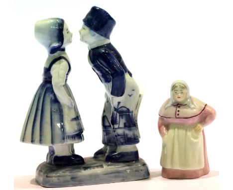 Early Royal Worcester ceramic candle snuffer with puce mark for 1912 and a Delft figure group, impressed 1802. P&amp;P Group 