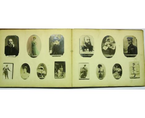 Early album of Ogden's Guinea Gold cigarette cards including actresses and army personnel. P&amp;P Group 1 (£14+VAT for the f