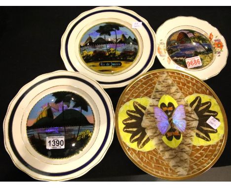 Four South American plates decorated with butterfly wings. P&amp;P Group 3 (£25+VAT for the first lot and £5+VAT for subseque